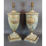 A pair of table lamps in the Regency style of oviform, each decorated with a reserve upon a