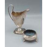 A George III silver pedestal cream jug, London 1792, makers mark C. H. 5ozs, together with a