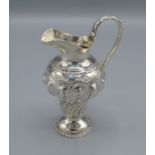A Victorian silver jug of spiral lobed form, London 1895, 3oz