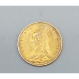 A Victorian gold shield back half Sovereign dated 1887