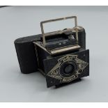 An Ensign Midget folding camera