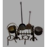 A wrought iron fire grate with andirons together with two trivets, three pans and a waffle iron