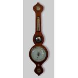 A 19th Century mahogany wheel barometer by A. J. Renshaw Beeston