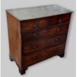 A 19th century oak chest, the moulded top above two short and three long drawers raised upon bracket