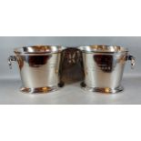 A pair of large oval Champagne coolers with circular ring side handles bearing inscription, 25cms