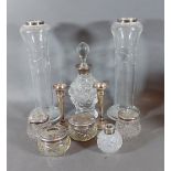A pair of silver mounted glass vases together with a pair of silver spill vases and six silver