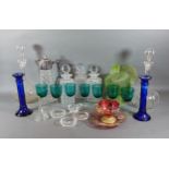 A set of three cut glass decanters with stoppers together with a collection of other glassware