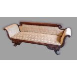 A William IV mahogany sofa, the carved back above a padded back and seat with a carved frieze and