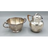A Sheffield silver two handled sucrier together with a Sheffield silver hot water pot, 12ozs