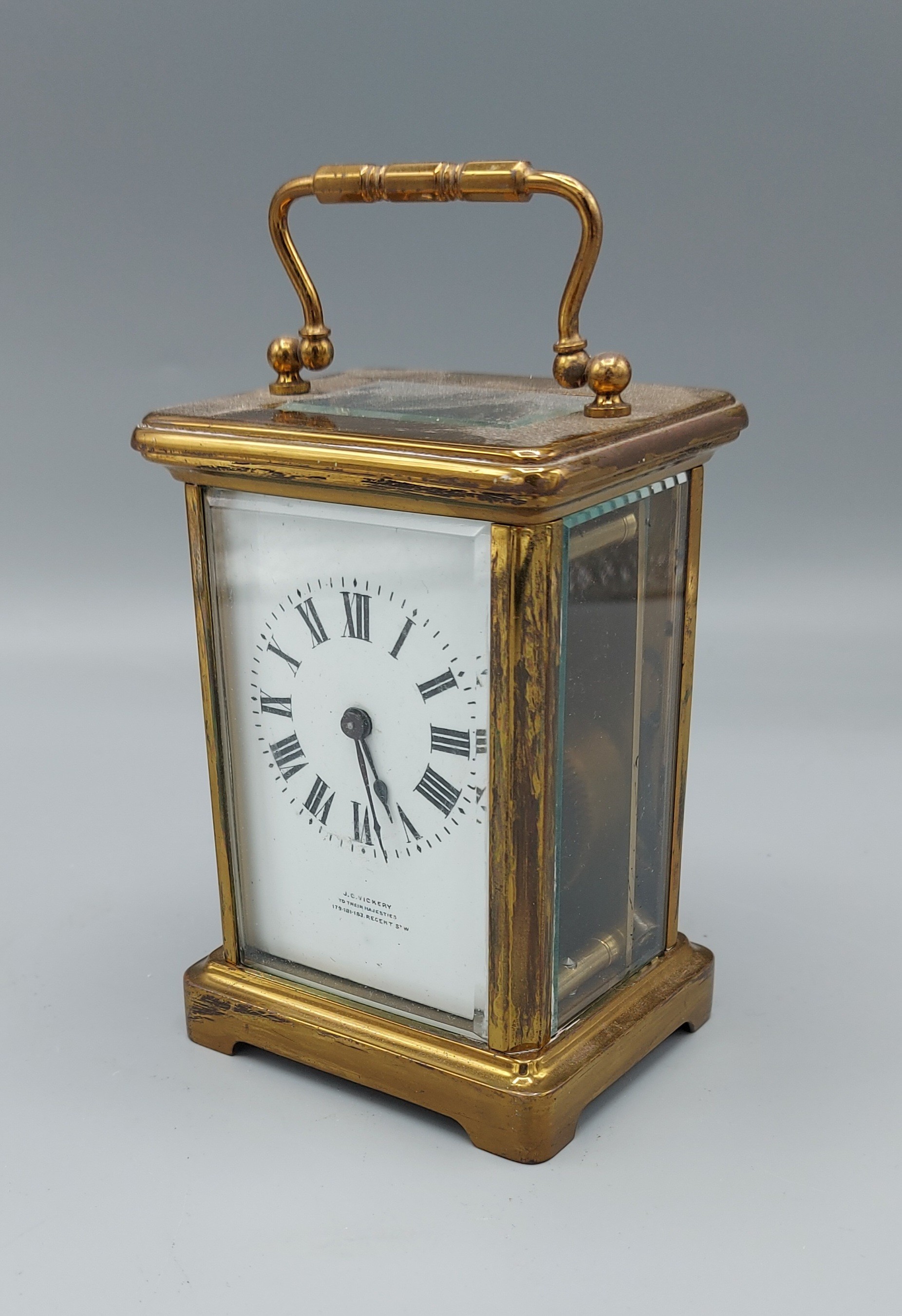 A brass cased carriage clock retailed by J. C. Vickery Regent Street, 11.5cms tall