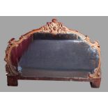 A Victorian large overmantel mirror, the frame carved with fruit amongst scrolls, 105cms tall x