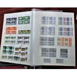Great Britain 1960-1970 sets mostly mint in blocks of four, Jumbo stockbook