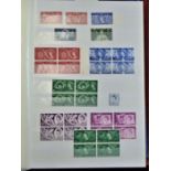 Great Britain 1953-1989 Fine mint with many blocks of four in Jumbo Stockbook, includes controls