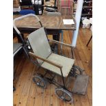 British WWI/II Allwin standard No.2 foldable wheelchair, a sturdy chair with a fabric seat