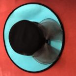 Ladies smart turquoise and black suede effect wide brim hat with net bow