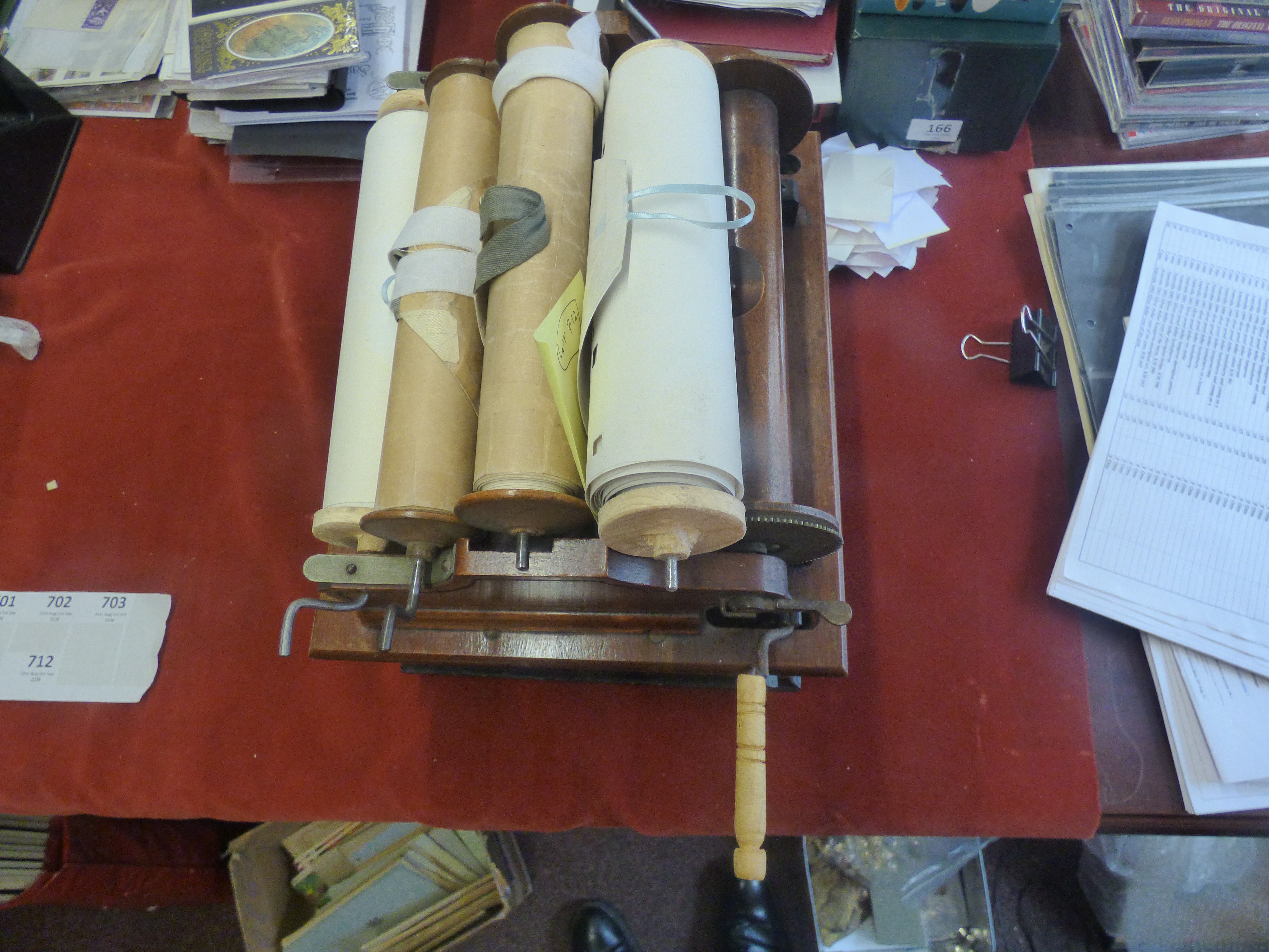 A Key Reed Pipe Clariona Organette, Walnut case with three 8" wide Rolls. Case very fine, sold as