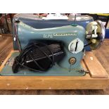 Vintage Alfa Challenge electric sewing machine with leather top case, untested, buyer collects.