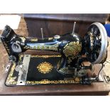 Antique Jones Shuttle Sewing Machine Family C.S, cased but no case key, very attractive black, red