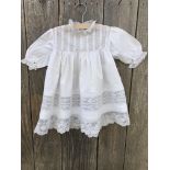 Fine handsewn Victorian cotton infant dress with deep border of pintucks, inserts of Valenciennes