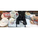 A mixed box of items including King George V Coronation mug, Clovelly Woodsware Jug (a/f), Vintage