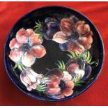 Moorcroft Bowl floral pattern navy footed bowl in very good condition.