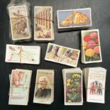 WD & HO Wills 10 sets of cigarette cards, varied subjects (Arms of Foreign Cities, Musical