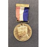 George VI Coronation medallion 1937, made for the Borough of Bridlington in white metal with ribbon.