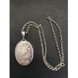 Silver Locket. Very large solid silver locket hallmarked Birmingham 1882, chain 1980. Total weight