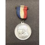 George V Silver Jubilee medallion 1935, made for the Borough of Bridlington in white metal with