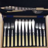 Canteen Of Cutlery in an Oak Box, knives and forks and spoons in silver plate. A mix of makers