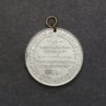 The Wesleyan Methodist twentieth century fund medallion 1898-1908 in white metal. In 1898,