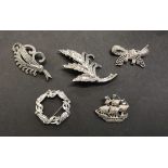 Silver coloured / white stone 1950s brooches marcasite (5) including a ship shaped brooch very