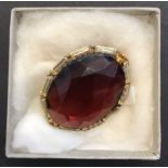 Large Costume Glass Brooch, reddish/orange glass, 5cm at widest part approx. in a box marked