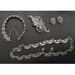 A boxed silver jewellery set. Bracelet, necklace, brooch and clip on earrings, marcasite 1940s/1950s