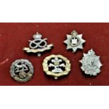 British Military Cap Badges (5) including: The Hampshire Regt, The Border Regt, The Devonshire Regt,