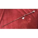 The Welch Regiment WWII Swagger stick, Silver-plated top with brass tip. Shows some signs of wear