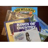 COUNTRY MUSIC VINYL LPS. A BOX OF FIFTY ASSORTED COUNTRY MUSIC VINYL ALBUMS, ALL IN GOOD