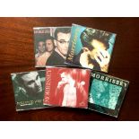 MORRISSEY CD SINGLES. A COLLECTION OF FIVE CD SINGLES BY MORRISSEY, ALL WITH ORIGINAL INSERTS AND