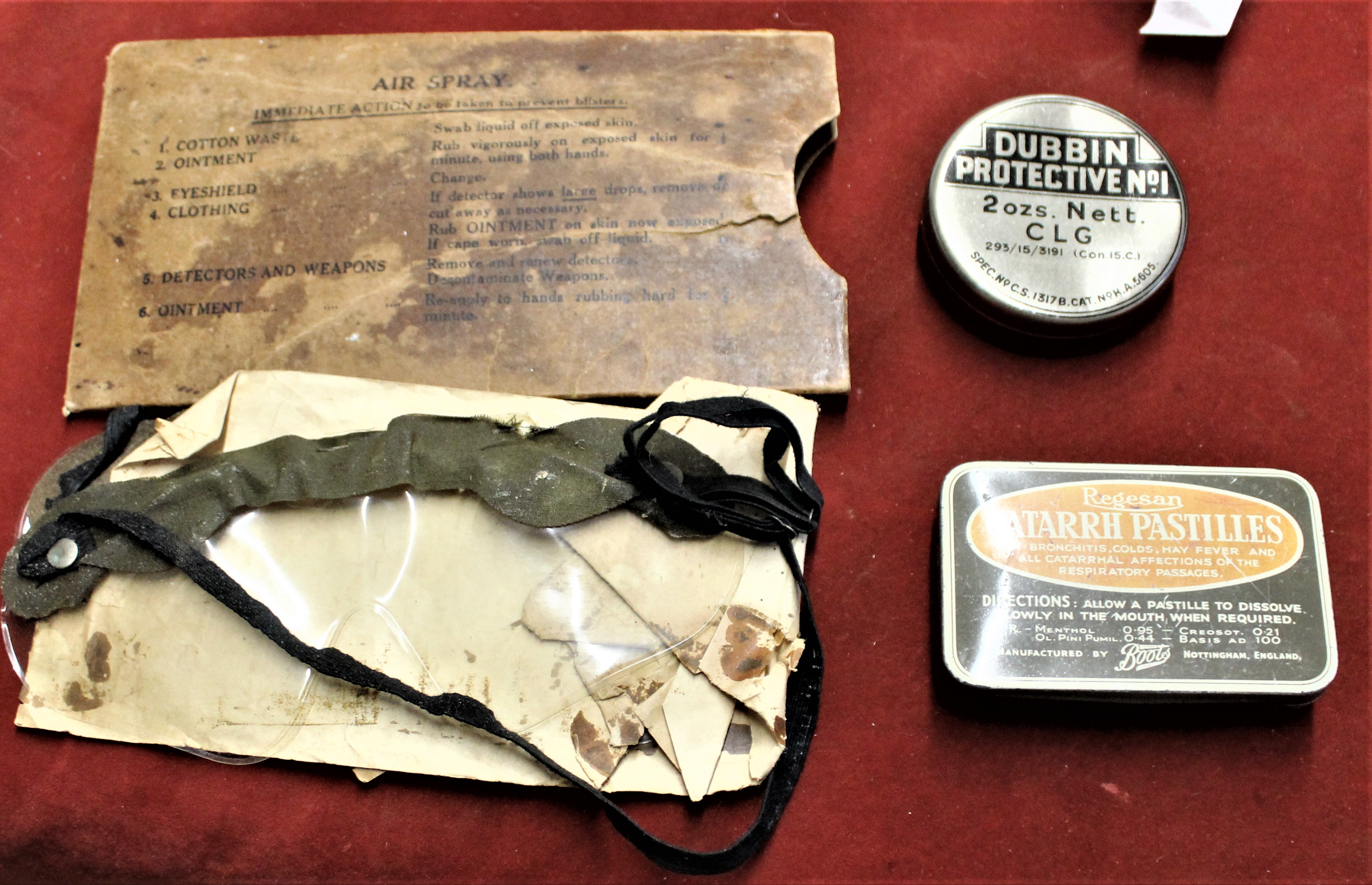 British WWII Anti Gas Eyeshields MK II dated 1941 which are worn and a tin of Military Dubbing named