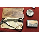 British WWII Anti Gas Eyeshields MK II dated 1941 which are worn and a tin of Military Dubbing named