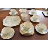 Bell China Art Deco hand painted tea set, with a blue floral design and gold trim. (21 pieces