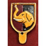 Vintage East African Car Badge - an Elephants Head on black and maroon striped background, scarce