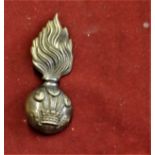 Royal Welsh Fusiliers Brass fur cap grenade with 2 loops to reverse. Ref: Gaylor Plate 9