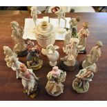Porcelain and Ceramic figurines and Urn (17) a good mixed lot of Foreign porcelain figurines. A good