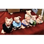 NatWest Piggy Bank family (6), five made by Wade and one other. All in perfect condition with