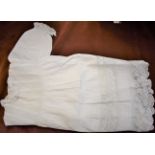 Fine handsewn Victorian cotton infant dress with deep border of pintucks, inserts of Valenciennes