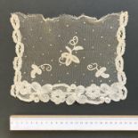 Small piece of Honiton lace on net with embroidered dots, mid to late 1800's