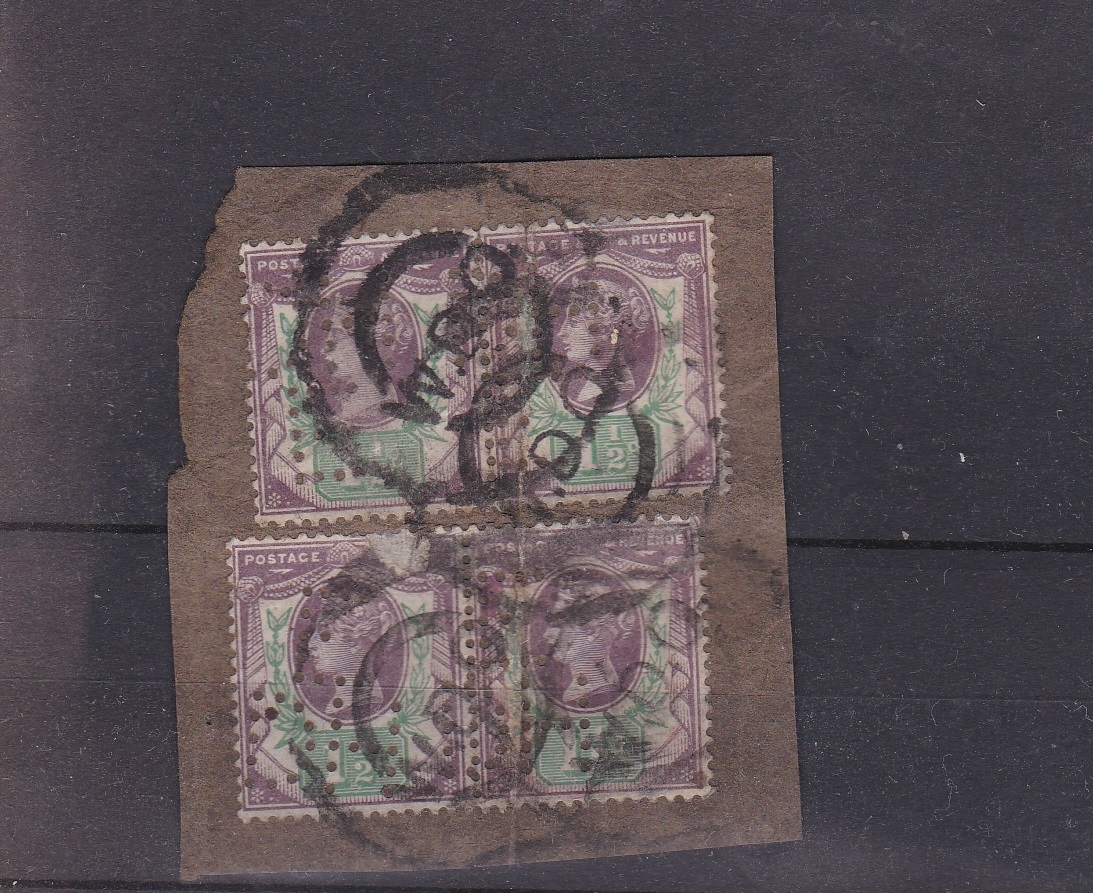 Great Britain 1887-92 Package piece with 2 pairs of SG198 1/2d perfin stamps cancelled with black