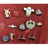 British Military badges and sweetheart badges (12) including: The Essex Regt, The Welsh Regt,