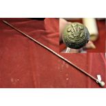 The Welch Regiment WWII Swagger stick, Silver-plated top with brass tip. Shows some signs of wear